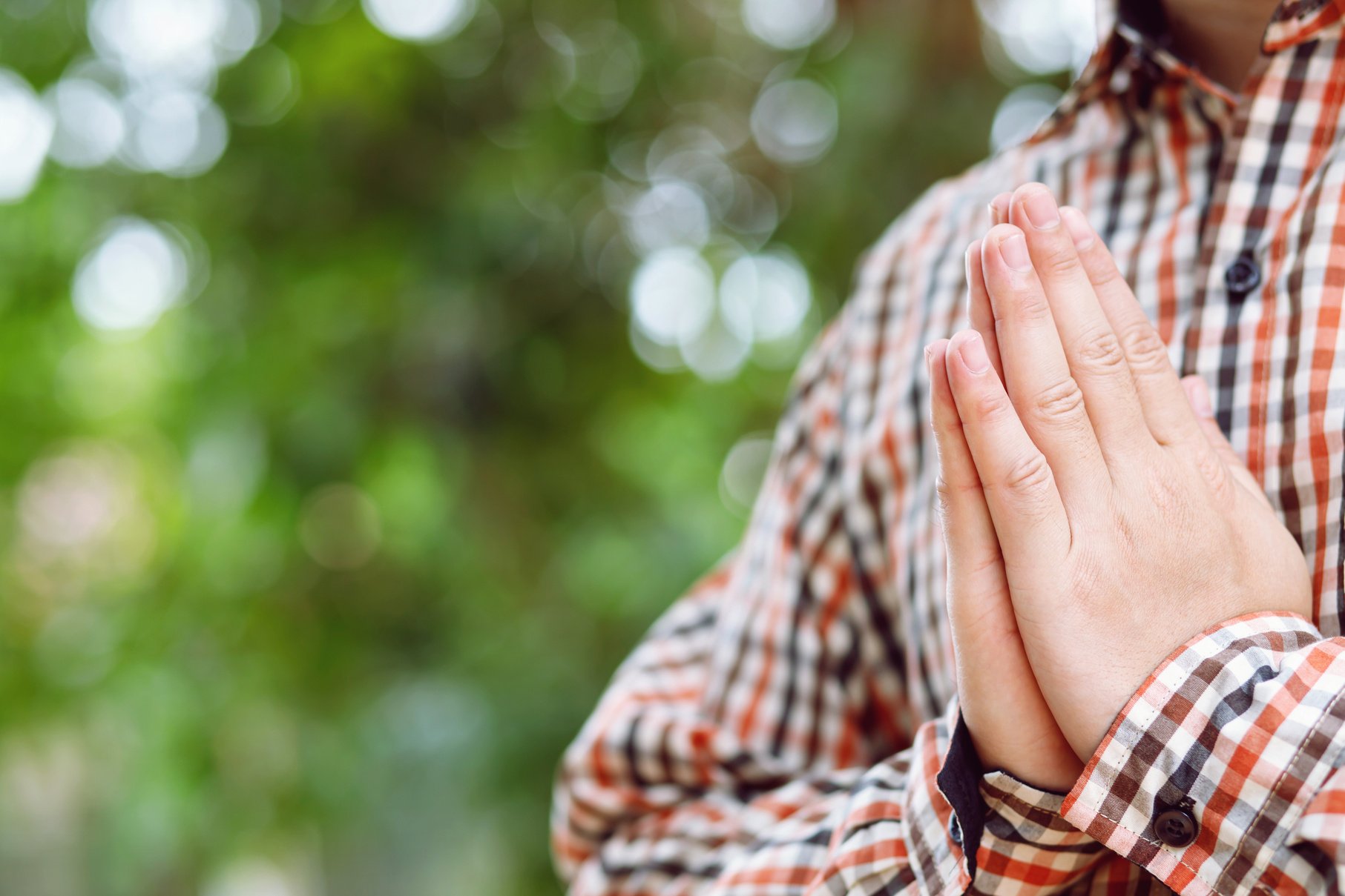 Boy with Hands in Prayer       